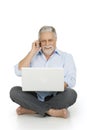Elderly man using laptop Royalty Free Stock Photo