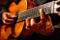 Elderly man in vintage attire playing acoustic guitar classic live music performance