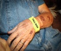 Elderly Man Wearing Fall Risk Bracelet