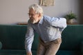 Elderly man writhes in pain suffers from low back strain Royalty Free Stock Photo