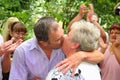 Happy Elderly Married Couple Kissing Royalty Free Stock Photo