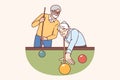 Elderly men play billiards, enjoying favorite hobby that allows spend time with friends