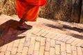 Buddhism Monk walks down the stairway