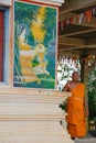 Elderly Monk Outside Temple Tonle Sap Lake Fishing Village, Cambodia Royalty Free Stock Photo