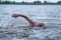 Elderly man swims Royalty Free Stock Photo