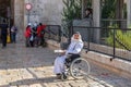 An elderly Muslim Arab sits near the Damascus Gate and begs for alms in the Muslim part of the old city of Jerusalem, Israel