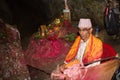 Elderly Nepali priest in a cave in Pokhara, Nepal