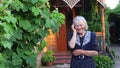 Elderly older female talking on phone