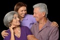 Elderly parents and their adult daughter Royalty Free Stock Photo