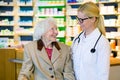 Elderly patient happy with her smiling doctor Royalty Free Stock Photo