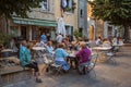 Elderly people in bar in the late afternoon in Vence.