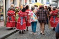 Elderly people are seen walking in the streets of Pelourinho dressed in clothes for the feast of Sao Joao