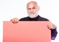 Elderly people. Senior holding blank sign board and looking at camera. Man bold head and gray beard hold poster for Royalty Free Stock Photo