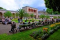 Elderly people together in park of a German spa town for summer season outdoor event