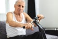 Elderly person standing with hands resting on medical walking stick. Concept of person with immobility, joints, rheumatism problem Royalty Free Stock Photo
