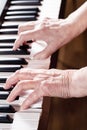 Elderly pianist plays the electronic piano