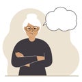 Elderly sad and upset grandmother thinks and empty thought, speech bubble. The arms are crossed over the chest. Place Royalty Free Stock Photo
