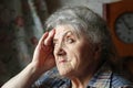 Elderly woman looking and headache Royalty Free Stock Photo