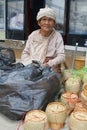 Portrait of a senior woman selling baskets, Vientiane, Laos