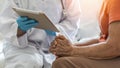 Elderly senior adult patient older person having geriatric doctor consulting and diagnostic examining on aging and mental health Royalty Free Stock Photo