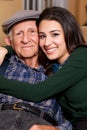 Elderly Senior Grandfather and Teen Granddaughter