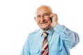 Elderly senior old businessman using his mobile phone and smiling isolated on white background Royalty Free Stock Photo