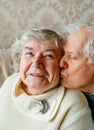 Elderly senior romantic love couple. Old retired man woman together. Aged husband wife in cozy home sweater.Elder Royalty Free Stock Photo