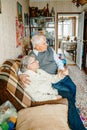 Elderly senior romantic love couple. Old retired man woman together. Aged husband wife in cozy home sweater.Elder Royalty Free Stock Photo