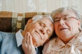 Elderly senior romantic love couple. Old retired man woman together. Aged husband wife in cozy home sweater.Elder Royalty Free Stock Photo