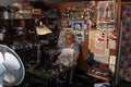 Elderly shoe repairman in his workshop Royalty Free Stock Photo