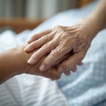 Elderly support Holding hands, expressing love and care in hospital