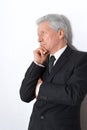 Elderly thoughtful businessman