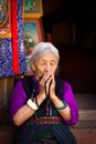 Elderly Tibetan Buddhist lady of Boudhanath Temple, Kathmandu, Nepal Royalty Free Stock Photo