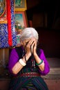 Elderly Tibetan Buddhist lady of Boudhanath Temple, Kathmandu, Nepal Royalty Free Stock Photo