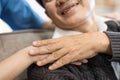 elderly touch hand on back of hand caregiver or nurses to express thankful Royalty Free Stock Photo