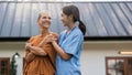 elderly touch hand on back of hand caregiver or nurses to express thankful Royalty Free Stock Photo