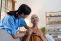 elderly touch hand on back of hand caregiver or nurses to express thankful Royalty Free Stock Photo