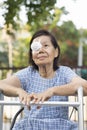 Elderly use eye shield covering after cataract surgery. Royalty Free Stock Photo