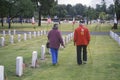 Elderly Veteran and Wife in Cemetery, Los Angeles, California