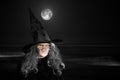 Elderly Witch In Black Hat - Waves & Full Moon