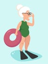 An elderly woman in a bathing suit and a lifebuoy is standing and surprisingly adjusting her glasses.