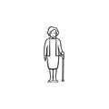 Pensioner woman with cane hand drawn outline doodle icon.