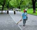 An elderly woman cleaners work for beihai park in Beijing