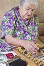 Elderly woman considers retirement Royalty Free Stock Photo