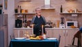 Elderly woman cooking for husband Royalty Free Stock Photo