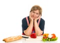 Elderly woman cooks food Royalty Free Stock Photo