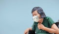 Elderly woman cough ,choke on wheelchair Royalty Free Stock Photo