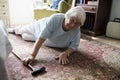 Elderly woman fell on the floor Royalty Free Stock Photo