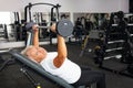 elderly woman with gray hair plays sports in gym. Active healthy lifestyle, pensioner, senior concept. Rehabilitation