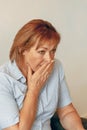 Elderly woman in grief. Loss of a loved one. The concept of loneliness and pain of the penioners Royalty Free Stock Photo